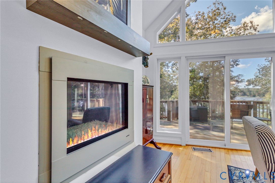 578 High Point Trail Heathsville, VA 22473 - Photo 12 of 50 a room with wooden floor and a fireplace