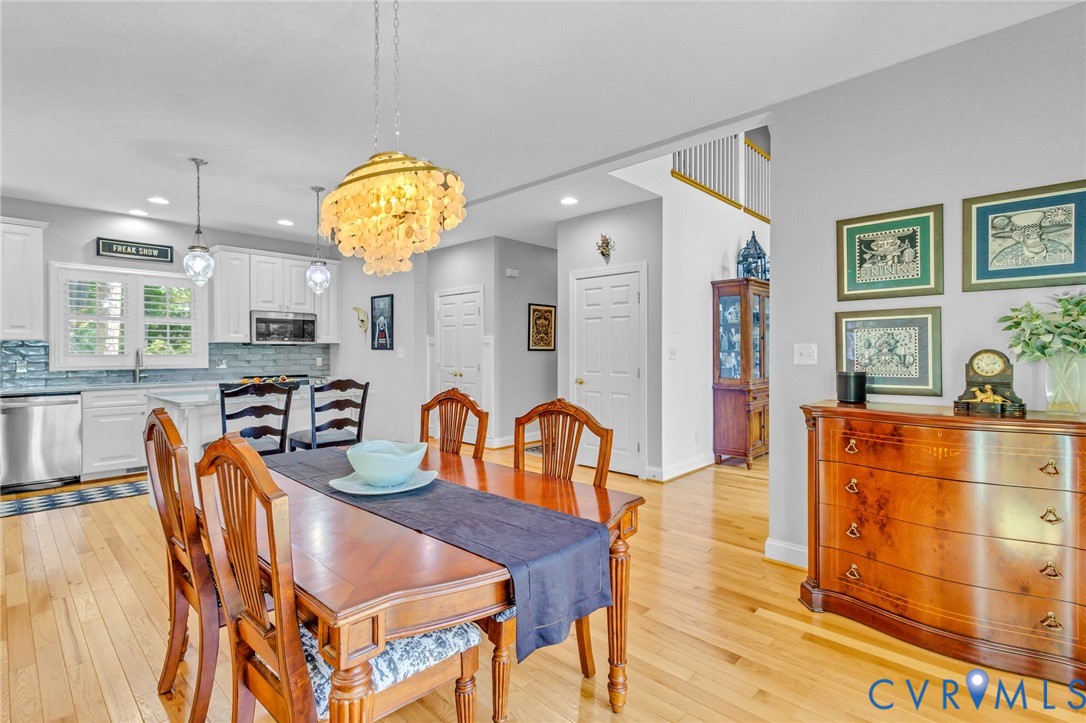 578 High Point Trail Heathsville, VA 22473 - Photo 18 of 50 a view of a dining room with furniture and chandelier