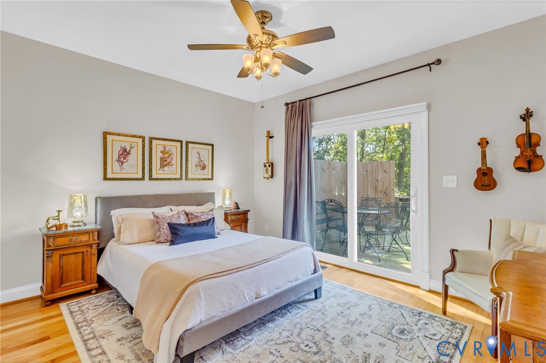 578 High Point Trail Heathsville, VA 22473 - Photo 20 of 50 a bedroom with a bed and a chandelier