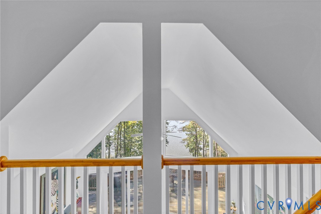 578 High Point Trail Heathsville, VA 22473 - Photo 26 of 50 a view of a balcony with wooden floor and fence