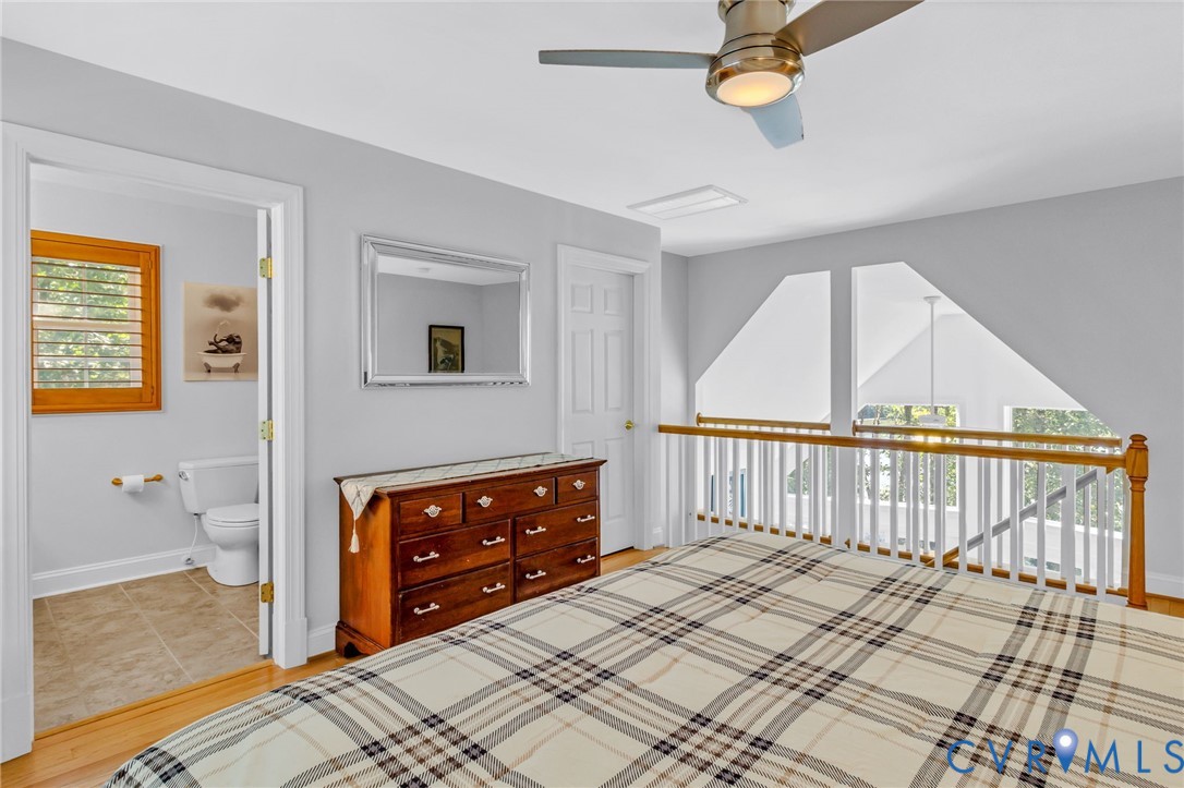 578 High Point Trail Heathsville, VA 22473 - Photo 28 of 50 a bedroom with a bed and a dresser