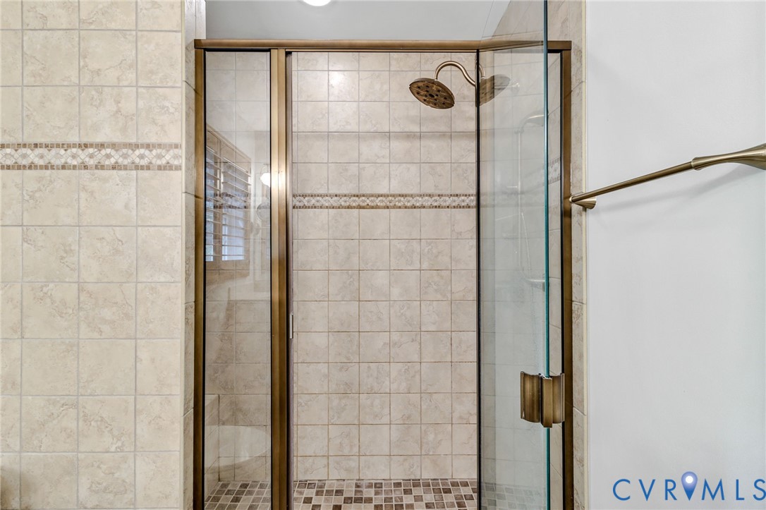 578 High Point Trail Heathsville, VA 22473 - Photo 30 of 50 a bathroom with a shower and a sink