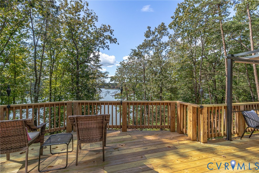 578 High Point Trail Heathsville, VA 22473 - Photo 31 of 50 a view of a chair and table on the wooden floor