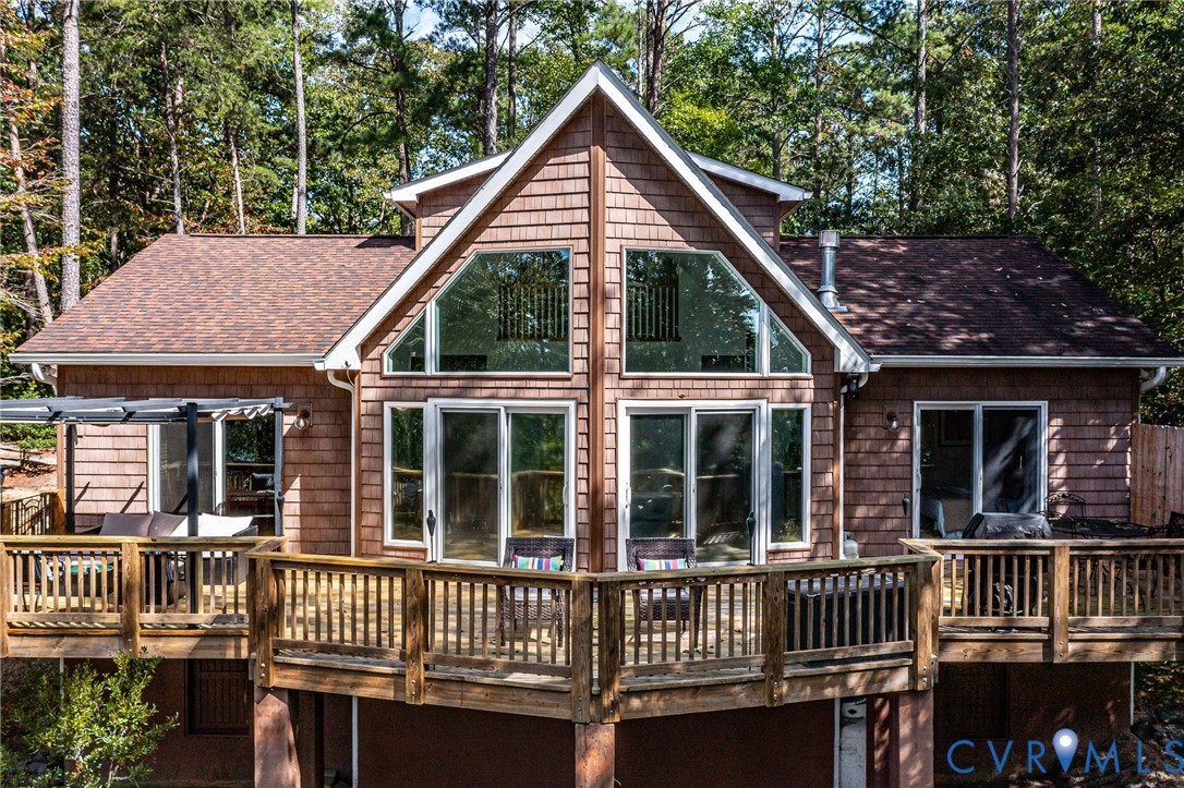 578 High Point Trail Heathsville, VA 22473 - Photo 4 of 50 a view of a house with a deck and a yard