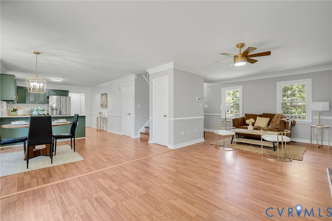 10110 Holly Road Mechanicsville, VA 23116 - Photo 10 of 26 Expansive common area featuring wood-finish floori
