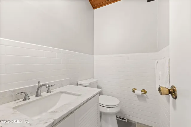 a bathroom with a sink and a toilet