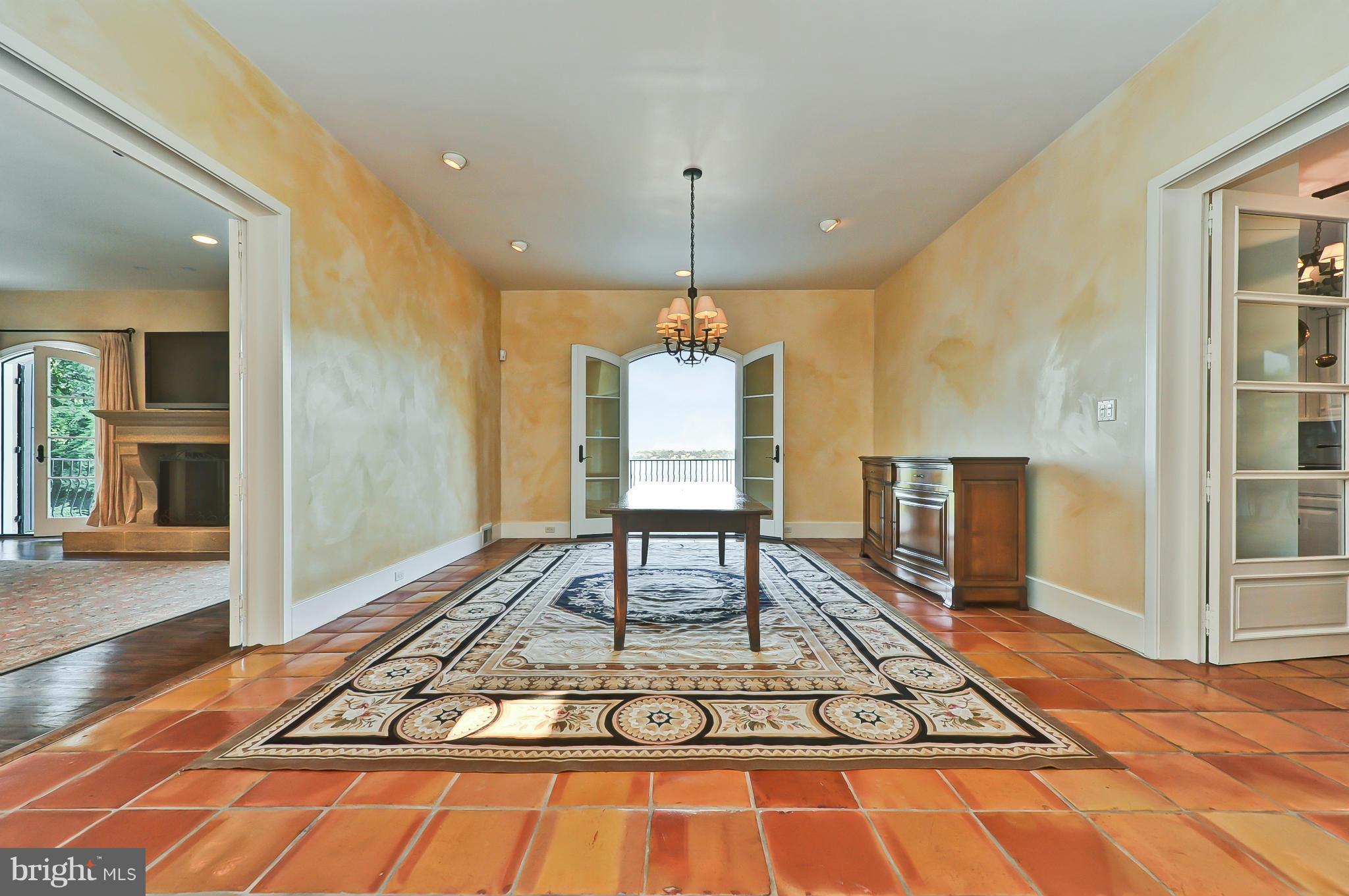 7608 Southdown Road Alexandria, VA 22308 - Photo 15 of 30 a living room with dining table