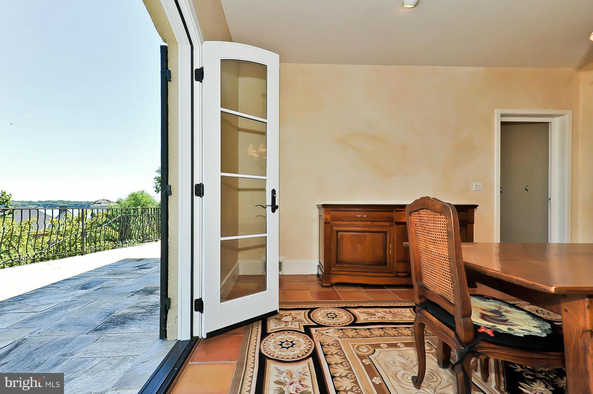 7608 Southdown Road Alexandria, VA 22308 - Photo 17 of 30 a view of an entryway with wooden floor