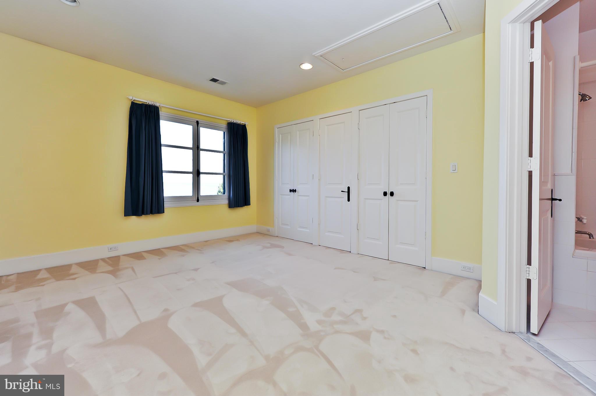 7608 Southdown Road Alexandria, VA 22308 - Photo 26 of 30 a view of an empty room with a window
