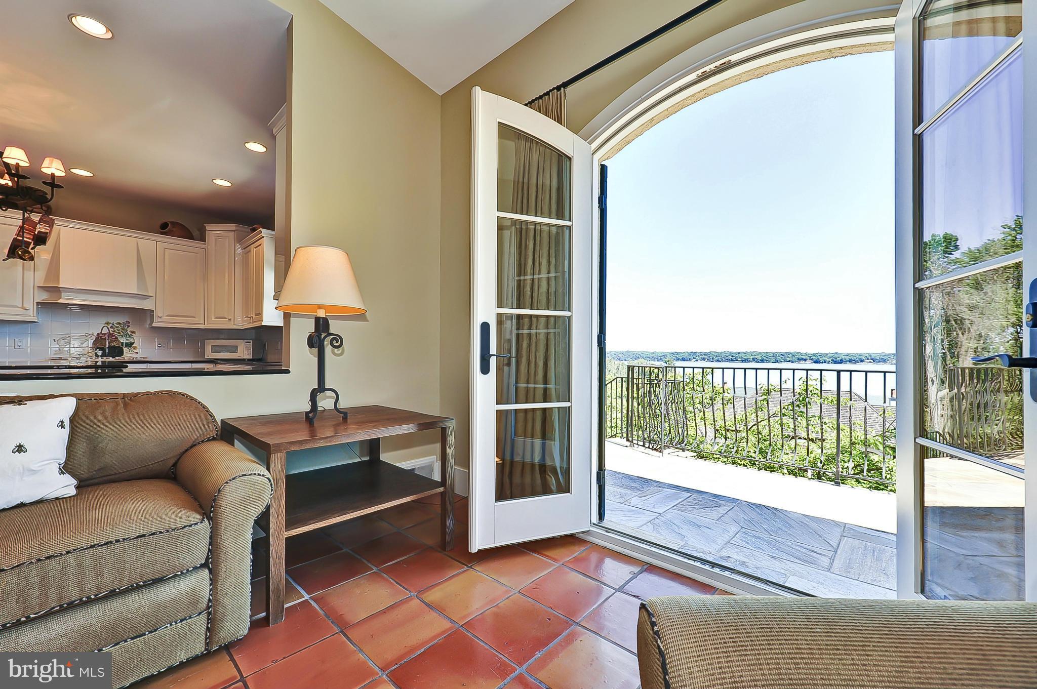 7608 Southdown Road Alexandria, VA 22308 - Photo 9 of 30 a living room with furniture and a large window