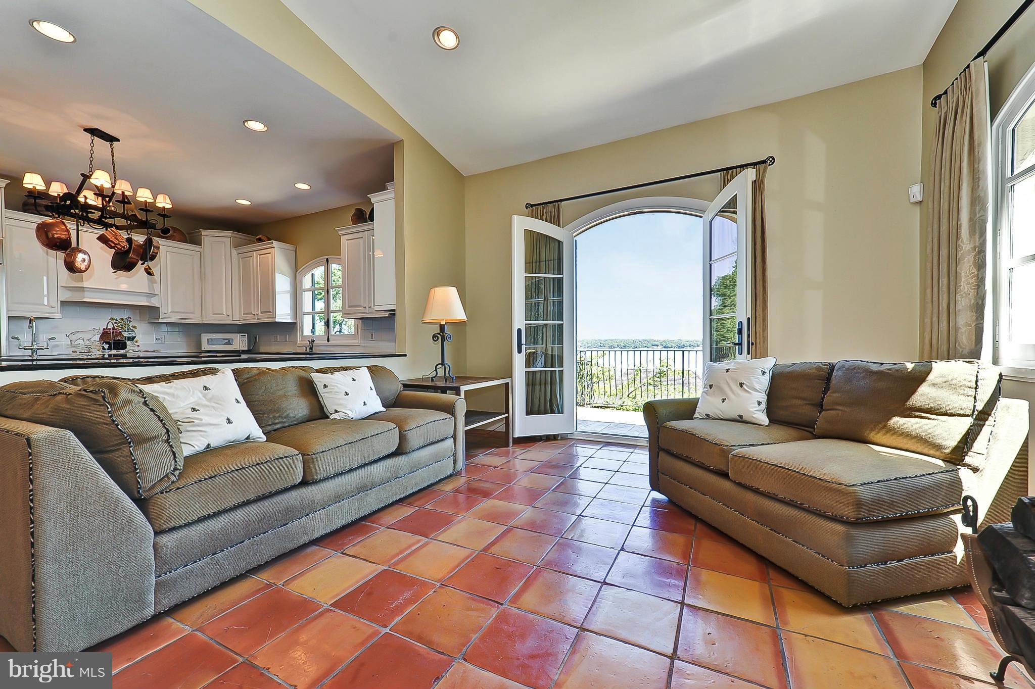 7608 Southdown Road Alexandria, VA 22308 - Photo 10 of 30 a living room with furniture and a large window