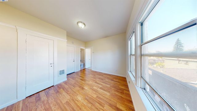 a view of an empty room and window