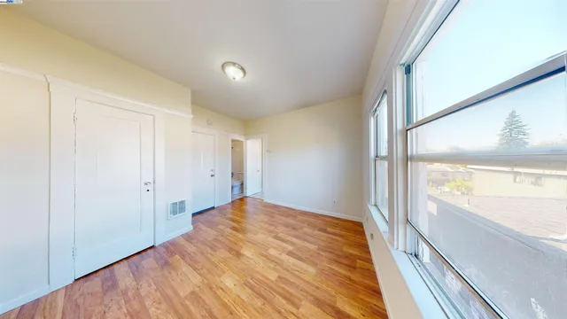 a view of an empty room and window