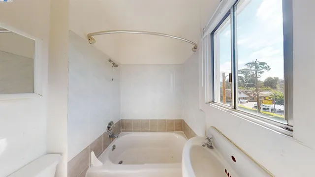 a bathroom with a sink and a bathtub
