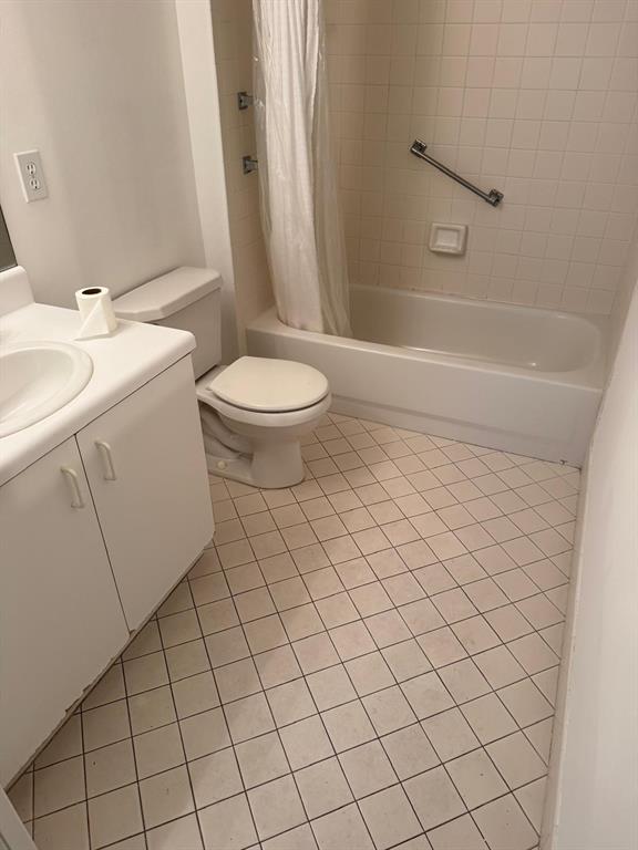 12551 Southwest 16th Court, Unit 306C Pembroke Pines, FL 33027 - Photo 14 of 16 a bathroom with a sink a toilet and shower