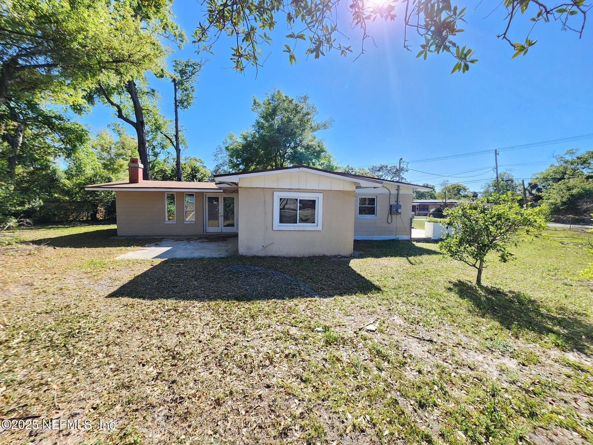 11547 Emuness Road Jacksonville, FL 32218 - Photo 10 of 16 a view of a house with a yard