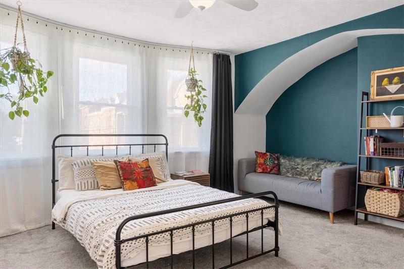 89 Craighead Street Pittsburgh, PA 15211 - Photo 20 of 29 a bedroom with bed and a window