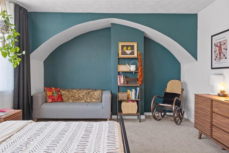 89 Craighead Street Pittsburgh, PA 15211 - Photo 21 of 29 a living room with furniture and a potted plant