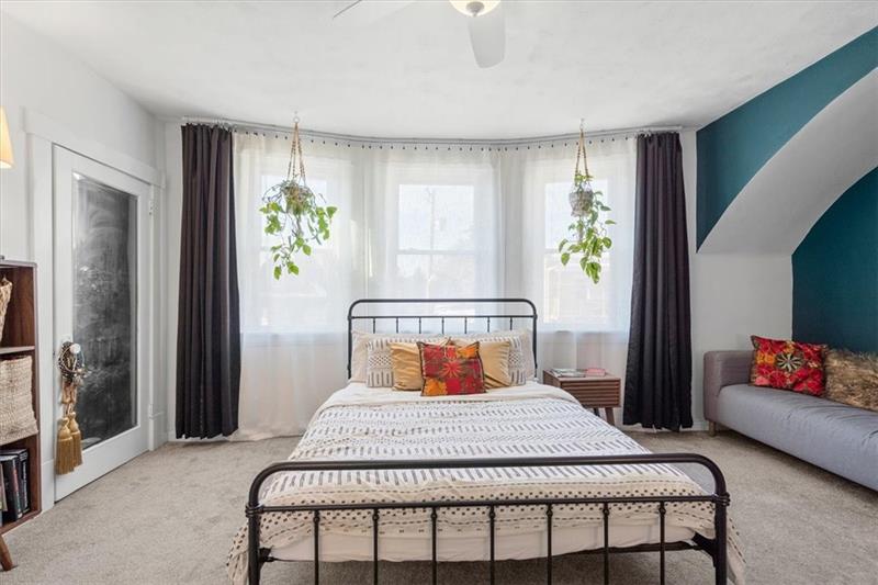 89 Craighead Street Pittsburgh, PA 15211 - Photo 23 of 29 a bedroom with a bed and a couch