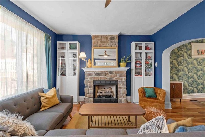 89 Craighead Street Pittsburgh, PA 15211 - Photo 5 of 29 a living room with furniture fireplace and window