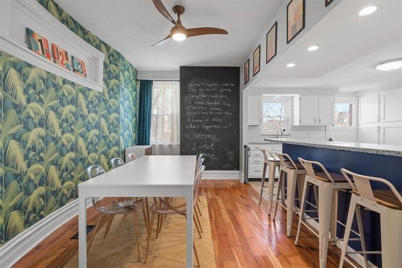 89 Craighead Street Pittsburgh, PA 15211 - Photo 10 of 29 a view of kitchen and dining room with windows