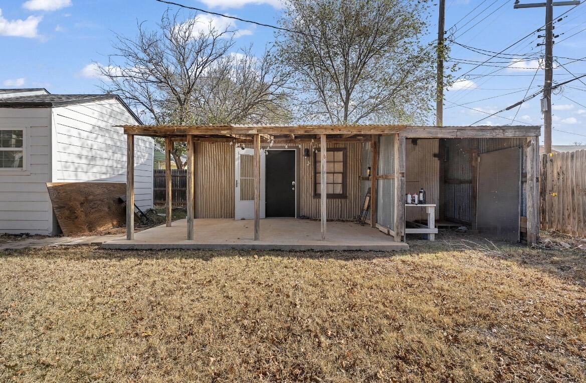 2511 28th Street Lubbock, TX 79410 - Photo 14 of 15 a view of a house with a yard
