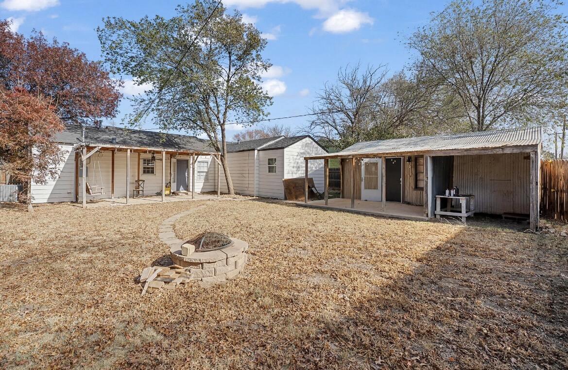 2511 28th Street Lubbock, TX 79410 - Photo 15 of 15 a front view of house with yard and trees around
