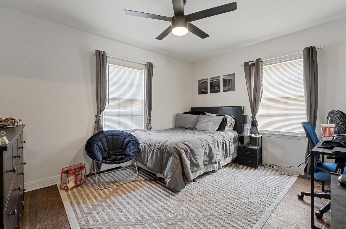 2511 28th Street Lubbock, TX 79410 - Photo 6 of 15 a bedroom with a bed and a window