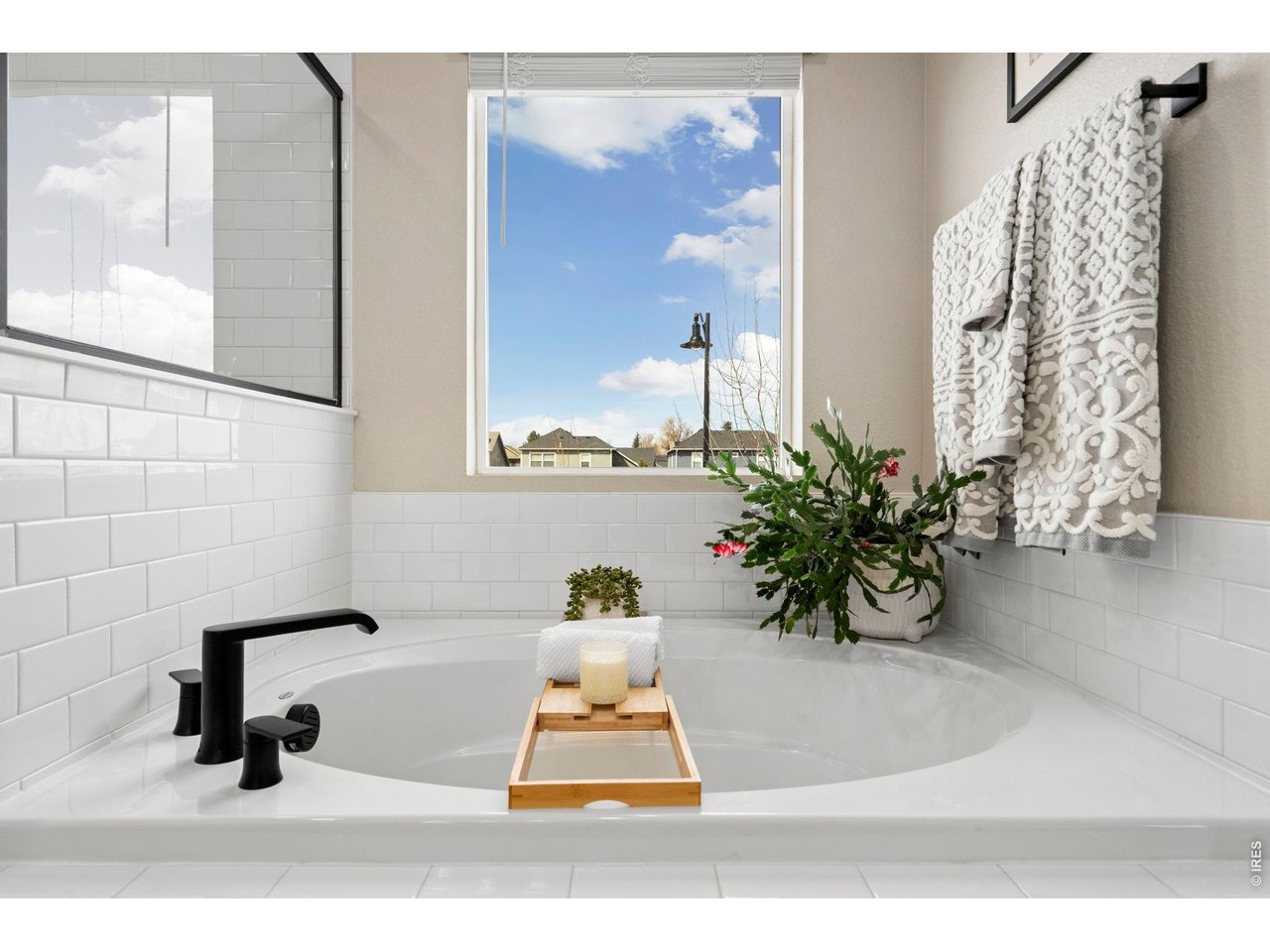 4433 Haymill Court Timnath, CO 80547 - Photo 28 of 39 a bathroom with a sink and a mirror