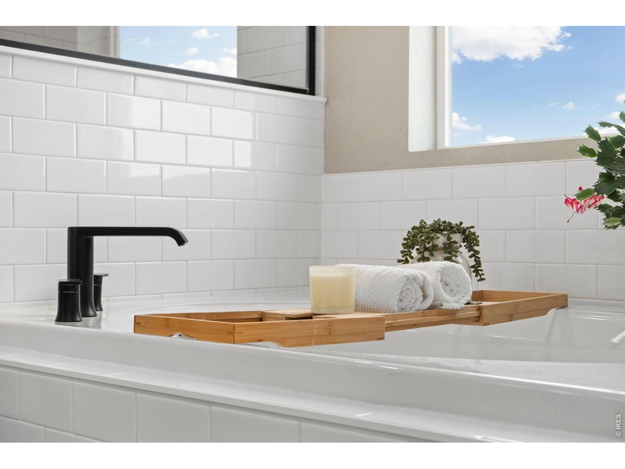 4433 Haymill Court Timnath, CO 80547 - Photo 29 of 39 a bathroom with a tub and shower