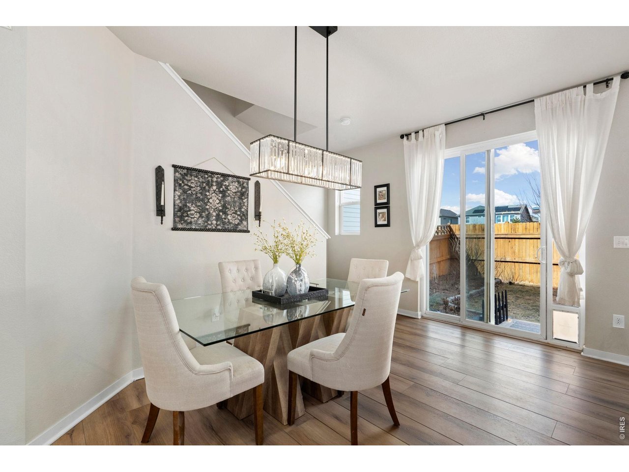 4433 Haymill Court Timnath, CO 80547 - Photo 9 of 39 a dining room with furniture and window