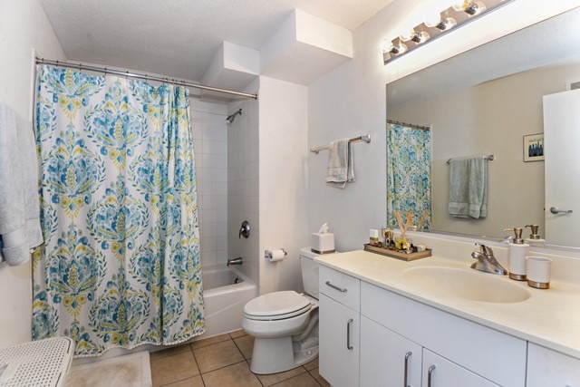 800 Elgin Road, Unit 1210 Evanston, IL 60201 - Photo 10 of 15 a bathroom with a sink toilet and shower