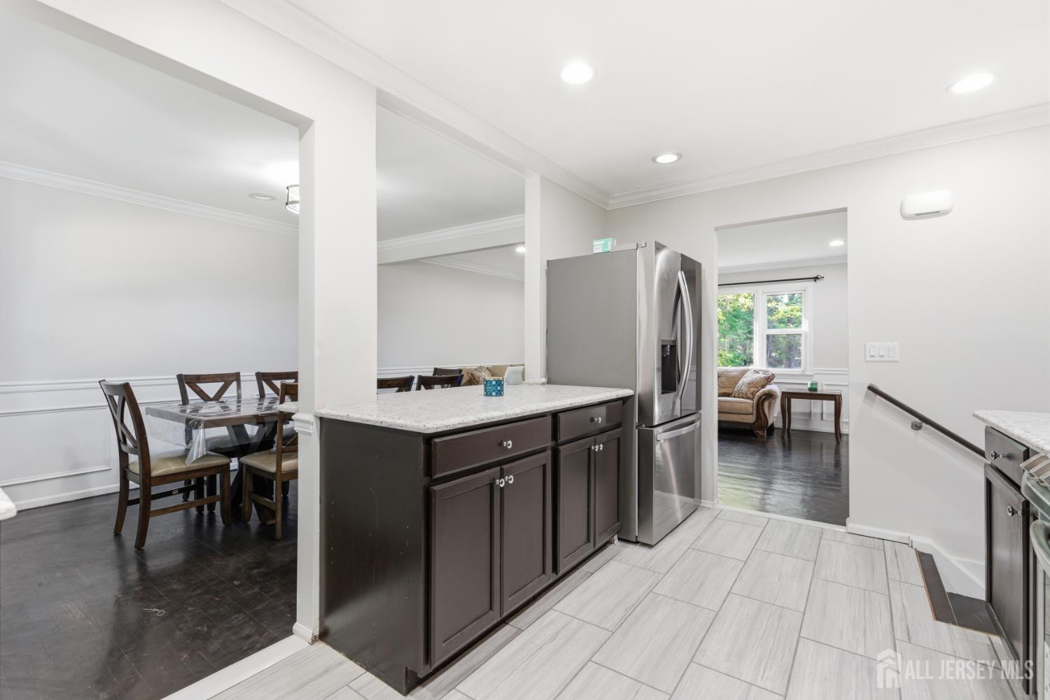 5 McKinley Street Edison, NJ 08820 - Photo 14 of 38 a kitchen with a table and chairs
