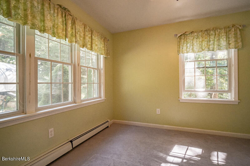 39 Pixley Road Monterey, MA 01230 - Photo 14 of 31 a view of an empty room with a window