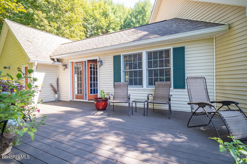 39 Pixley Road Monterey, MA 01230 - Photo 17 of 31 a view of a house with sitting area and garden
