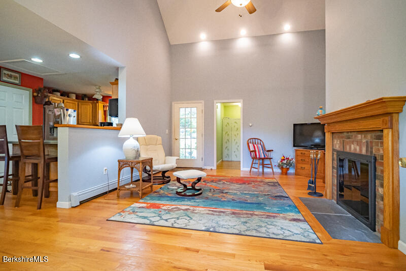 39 Pixley Road Monterey, MA 01230 - Photo 6 of 31 a bed room with a bed furniture and a fireplace