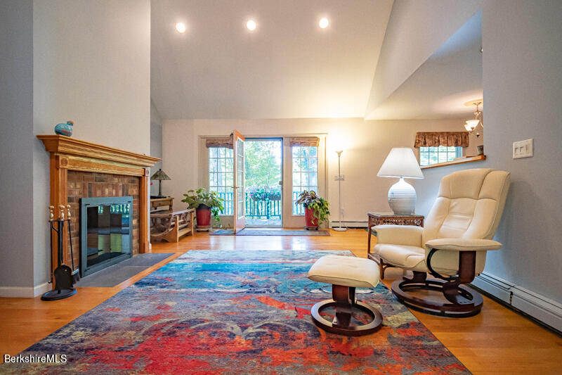 39 Pixley Road Monterey, MA 01230 - Photo 7 of 31 a living room with furniture a rug and a large window