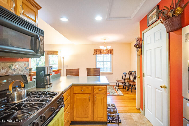 39 Pixley Road Monterey, MA 01230 - Photo 10 of 31 a kitchen with counter top space and wooden floor