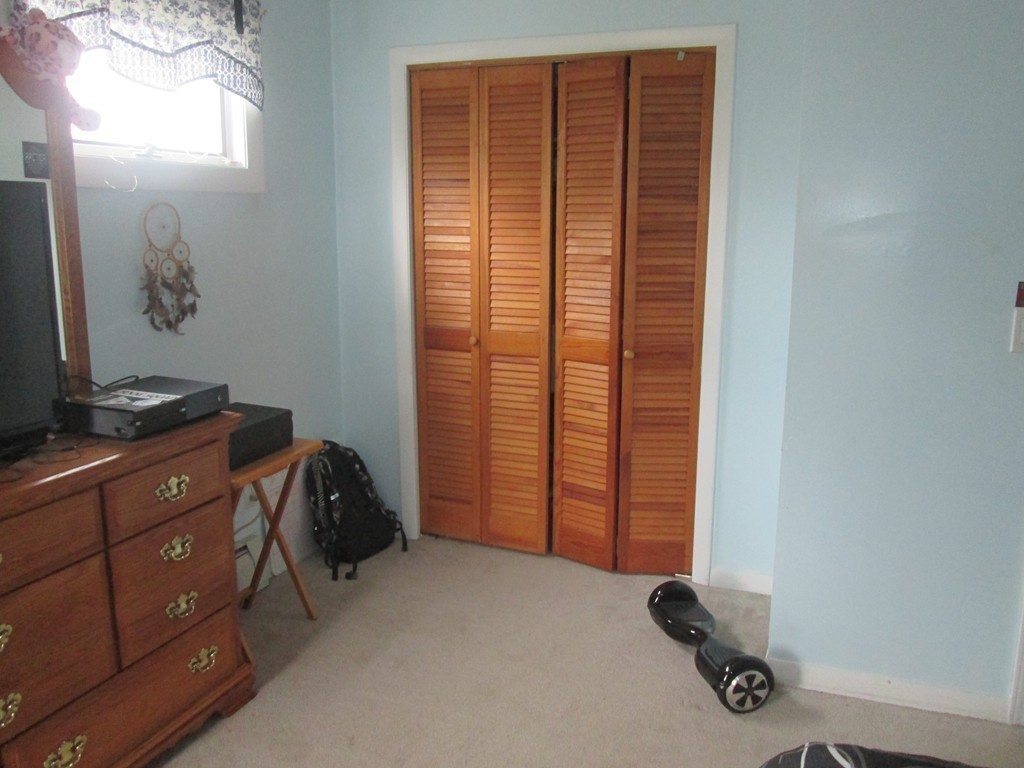 334 Killdeer Road Webster, MA 01570 - Photo 18 of 28 a view of a livingroom with furniture and a window