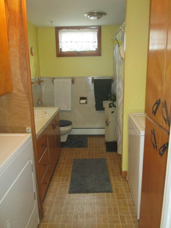 334 Killdeer Road Webster, MA 01570 - Photo 21 of 28 a bathroom with a toilet and a shower
