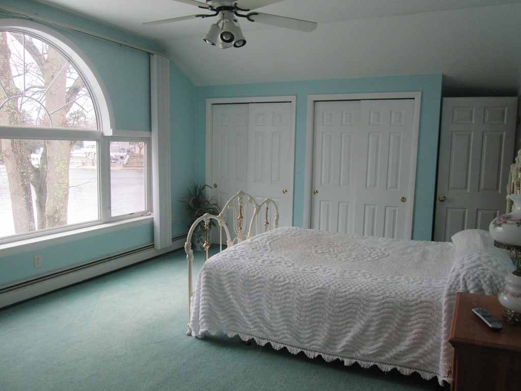 334 Killdeer Road Webster, MA 01570 - Photo 24 of 28 a bedroom with a bed and a window