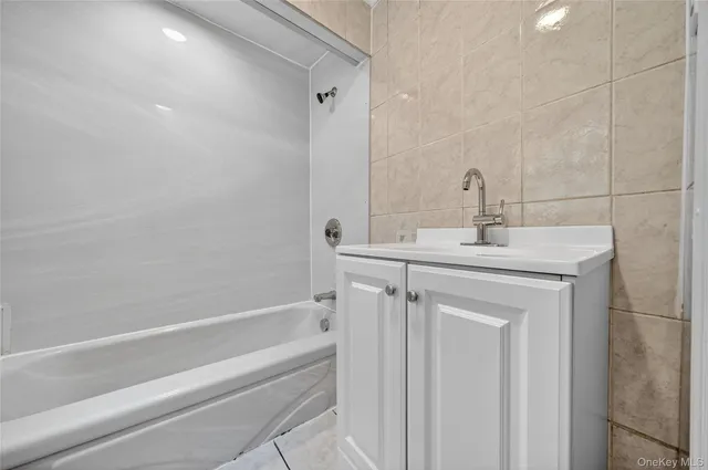 a bathroom with a sink and a vanity