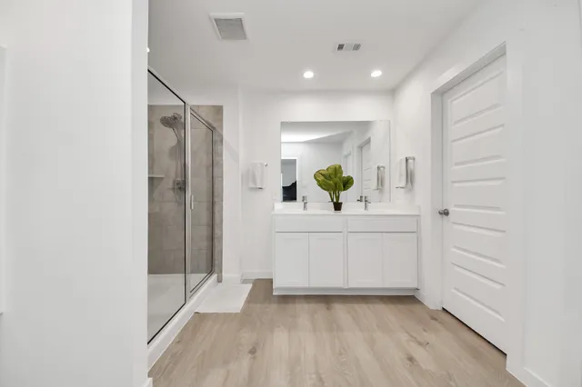 a view of kitchen with wooden floor and window