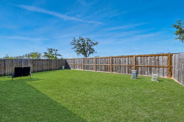 a view of a backyard with a garden