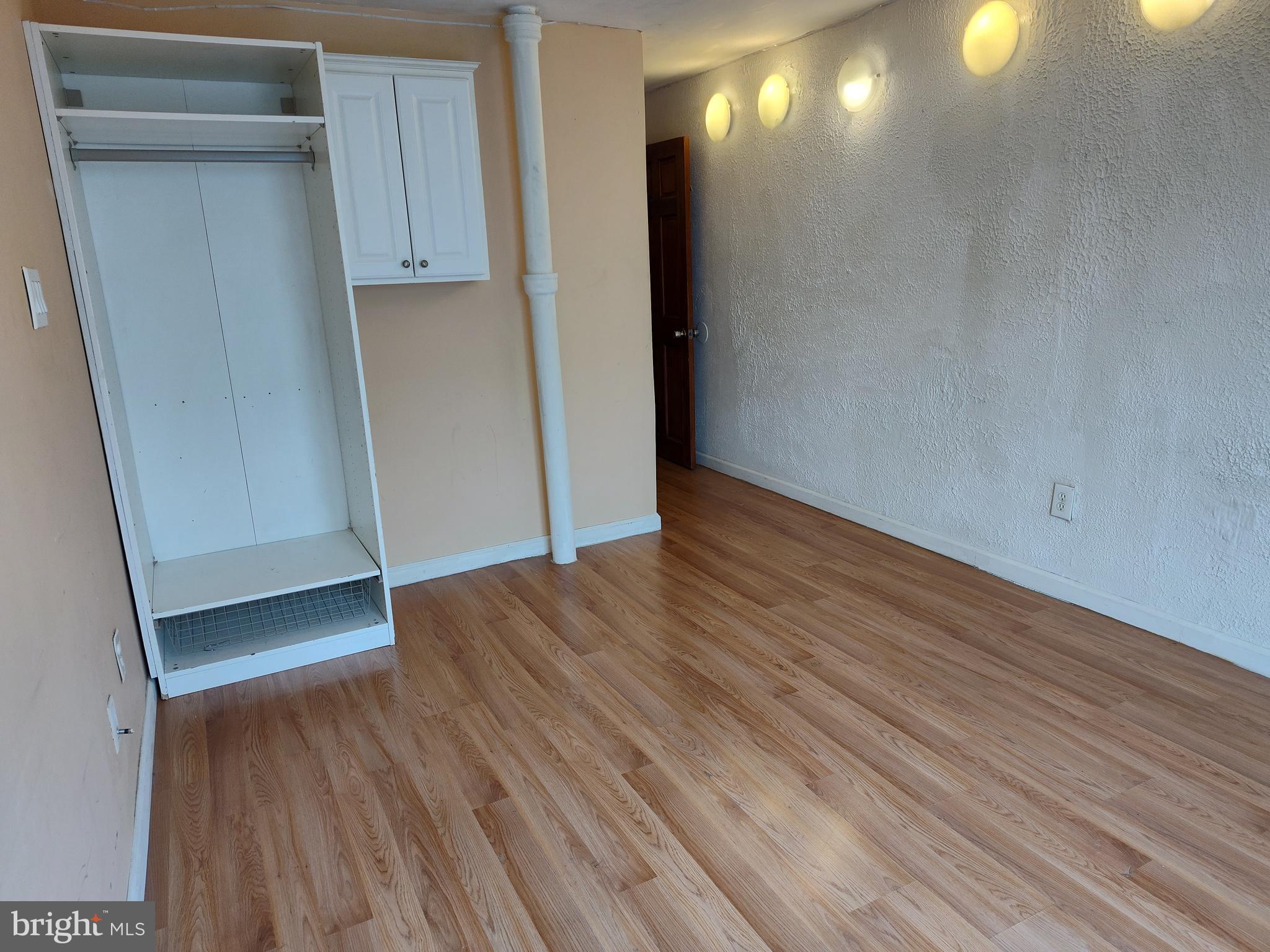 1607 Page Street Philadelphia, PA 19121 - Photo 4 of 14 a view of hallway with wooden floor