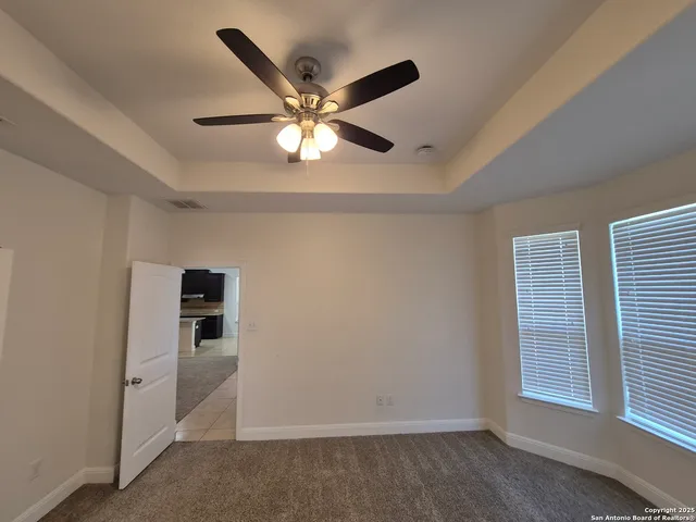 a bathroom with a double vanity sink toilet and shower