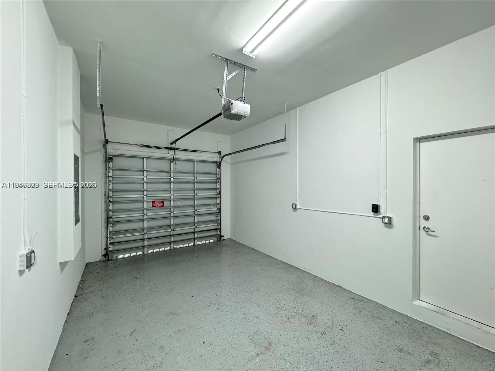 2933 Southwest 27th Terrace Miami, FL 33133 - Photo 14 of 32 garage with epoxy floor