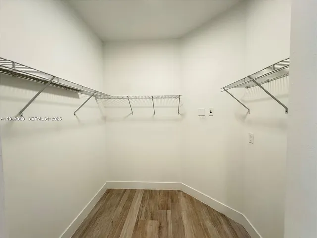 a view of a room with racks on the wall