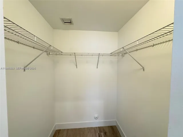 a view of a room with racks on the wall