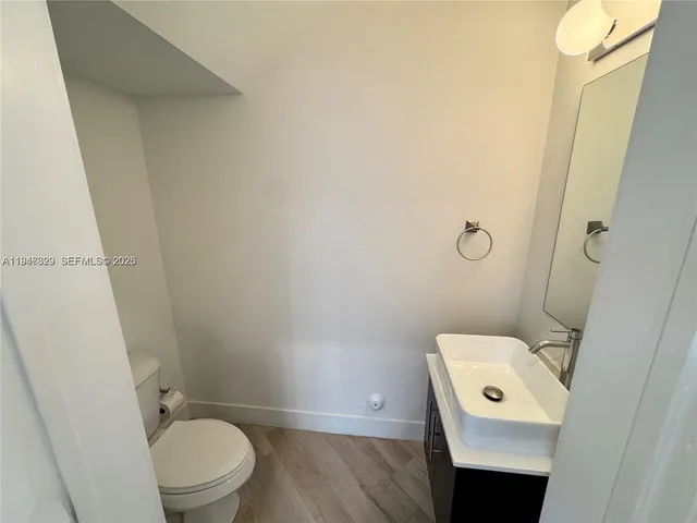 a bathroom with a toilet and a sink